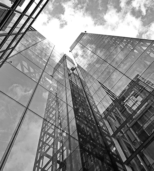 Glass office towers seen from below